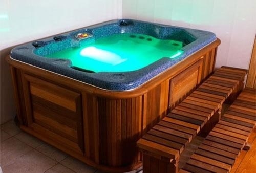 arctic spas hot tub with green lights